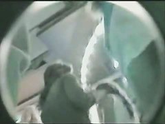 Upskirt video of a woman in white things on the nighttime streets