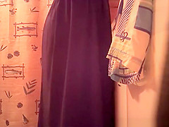 Woman spied in bathroom undressing
