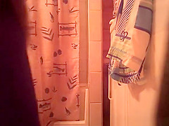 Woman spied in bathroom undressing