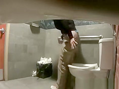 Women caught peeing in toilet