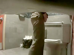 Women caught peeing in toilet