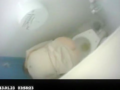 Women caught pissing in public toilet