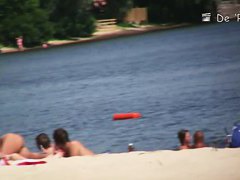 Xxx beach porno vid of some topless women apply tanning lotion