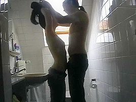Young couple makes porn video in public bathroom
