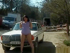 big natural girl pissing on street