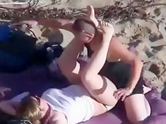 can't believe his eyes  strapon lesbian action at the beach !!!