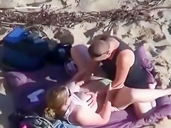 can't believe his eyes  strapon lesbian action at the beach !!!