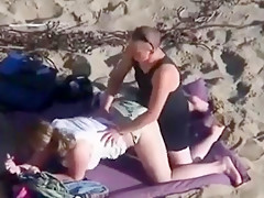can't believe his eyes  strapon lesbian action at the beach !!!