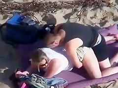 can't believe his eyes  strapon lesbian action at the beach !!!