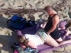 can't believe his eyes  strapon lesbian action at the beach !!!