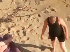 can't believe his eyes  strapon lesbian action at the beach !!!