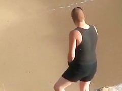 can't believe his eyes  strapon lesbian action at the beach !!!