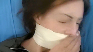 microfoam gagged and tape bound in leather jacket and boots