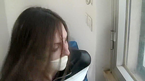 microfoam gagged and tape bound in leather jacket and boots
