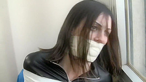 microfoam gagged and tape bound in leather jacket and boots