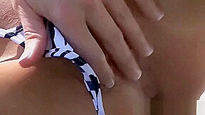 model in micro bikini shows off her lippy pussy