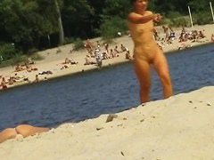 preys on a juicy ass on the nudist beach