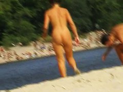 preys on a juicy ass on the nudist beach
