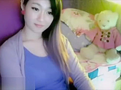 sexy Japanese webcam girl in blue - more at sexywebcum com