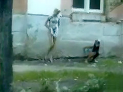 teen 18+ blonde in a dress pees in public