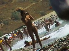 video of nude girls having fun on a nudist beach