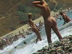 video of nude girls having fun on a nudist beach
