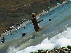 video of nude girls having fun on a nudist beach