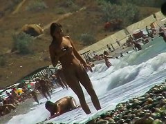 video of nude girls having fun on a nudist beach