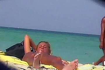 video shot a nudist beach exposing sexy babes sunbathing