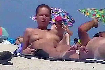 video shot a nudist beach exposing sexy babes sunbathing