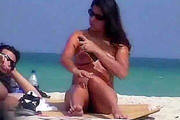 video shot a nudist beach exposing sexy babes sunbathing