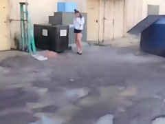 waitress takes a bbc break behind the restaurant